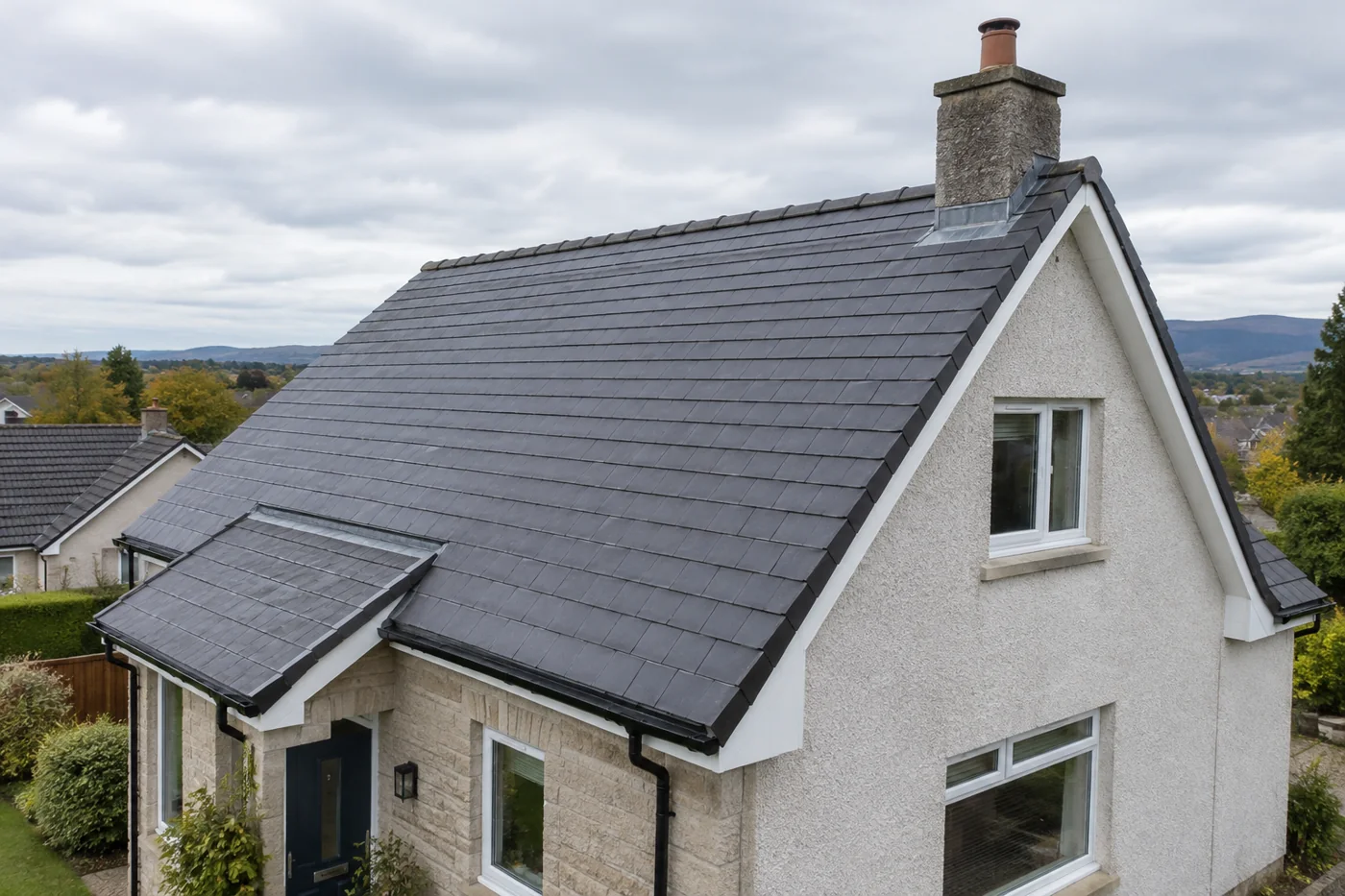 Domestic gable roof showing chimney and roof edges