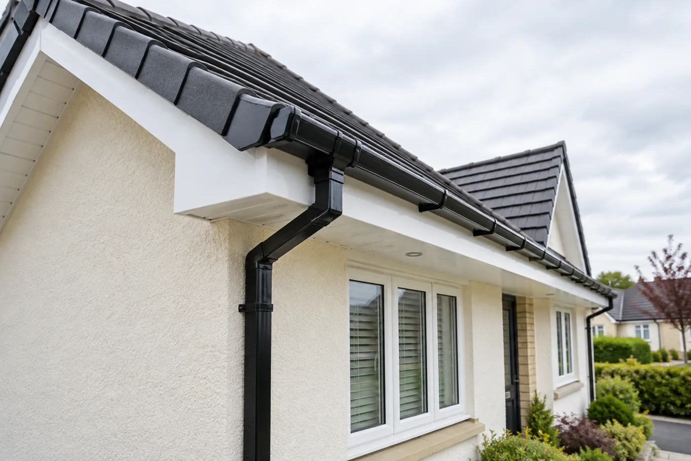 Fascia and soffit beneath tiled domestic eaves