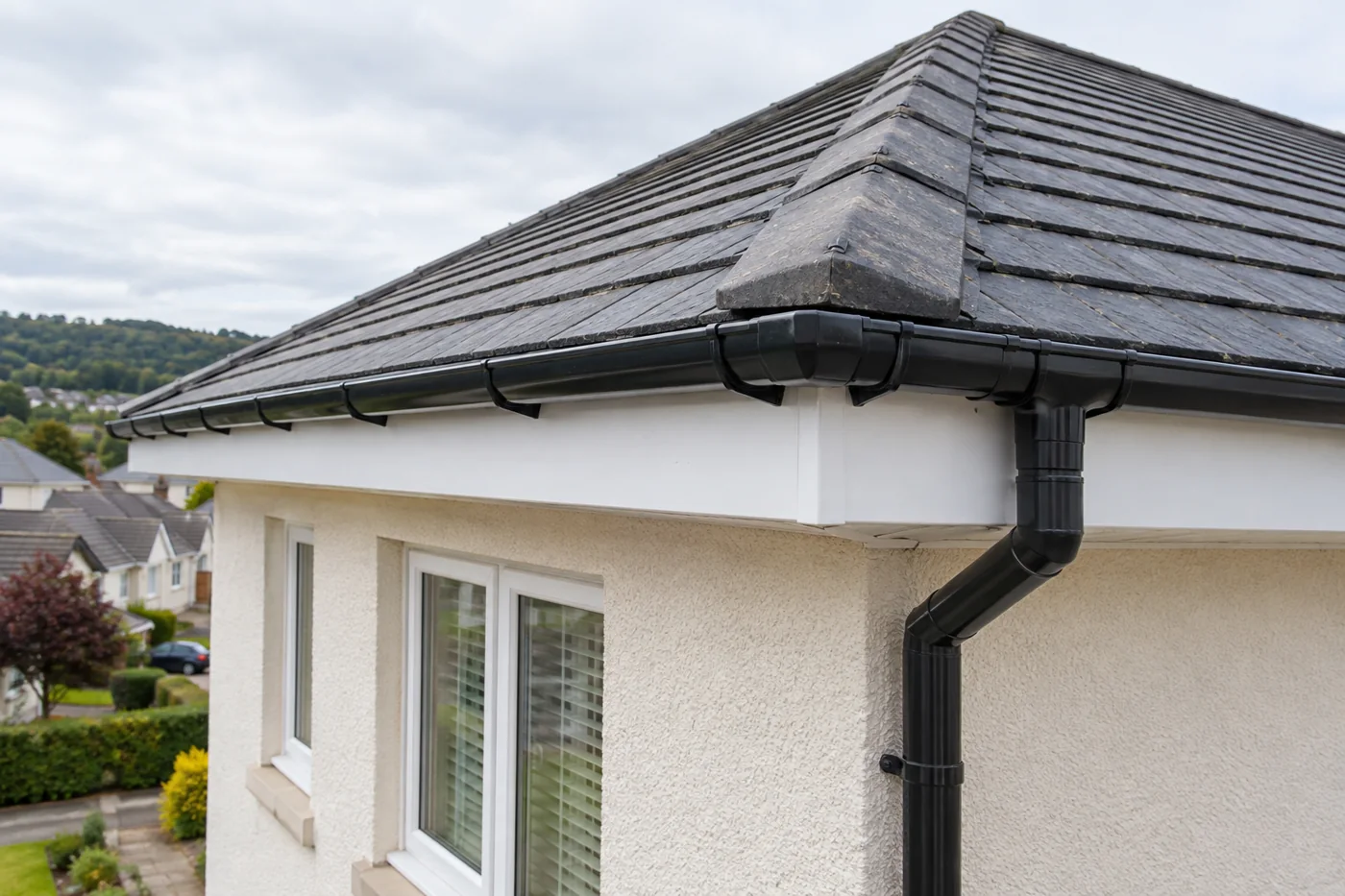 Fascia, soffit, gutter and downpipe junction